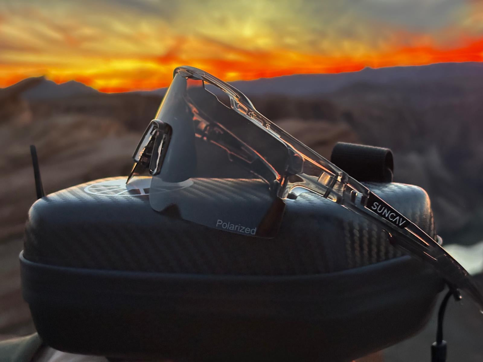 Photochromic, polarized, and ultra-resistant sports sunglasses.