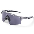 Photochromic, polarized, and ultra-resistant sports sunglasses.